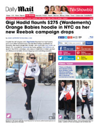press: gigi hadid flaunts wardements orange babies hoodie for a good cause